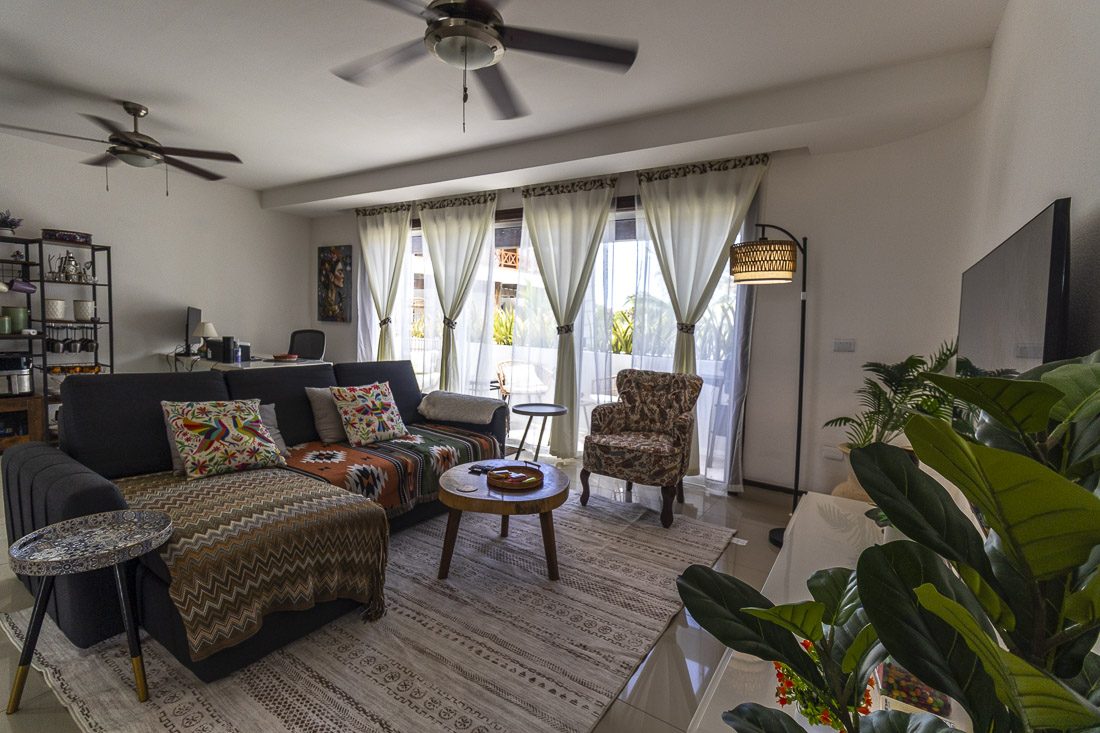 Bright living room at Avalon del Sol with modern furnishings and natural light