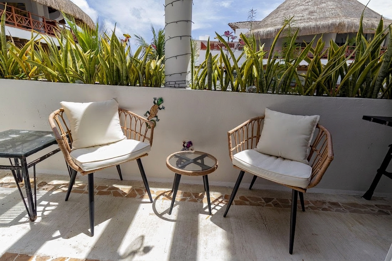 Bedroom interior at Avalon del Sol with tropical decor